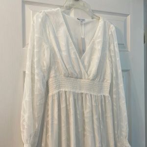 White long sleeve maxi dress with leg slit
